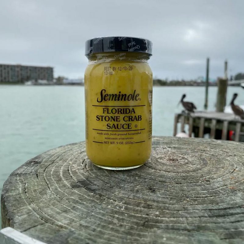 Seminole Florida Stone Crab Sauce displayed on dock of seafood market