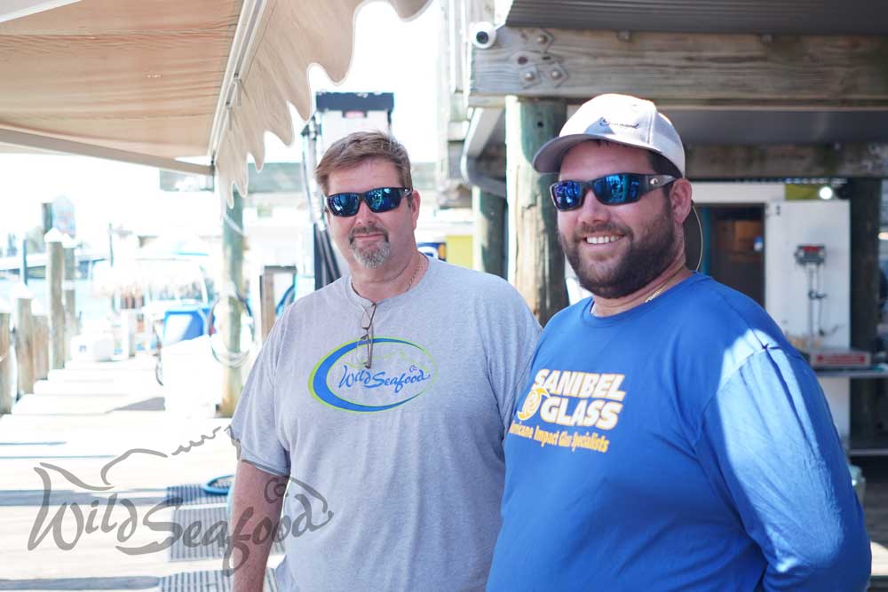 Company Owner and Captain on Dock at Wild Seafood Market